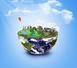 halve wereldbol met daarop een landschap