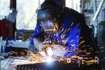 lasser aan het werk